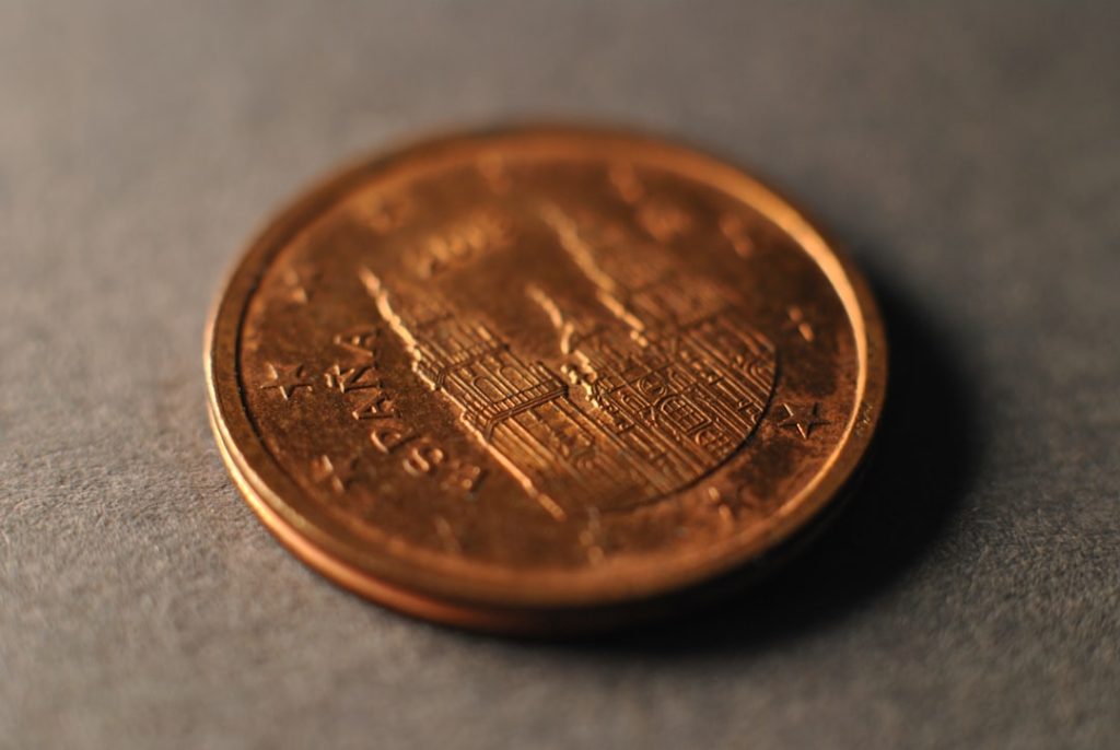 A close up of a penny on a table