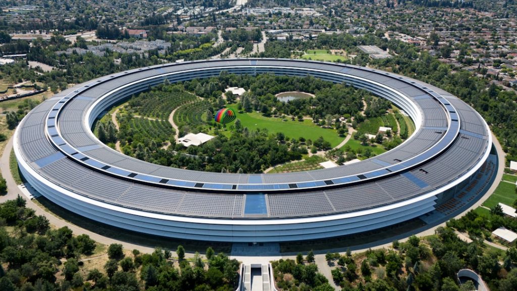 An aerial view of a building with a circular roof