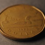 A close up of a coin on a table